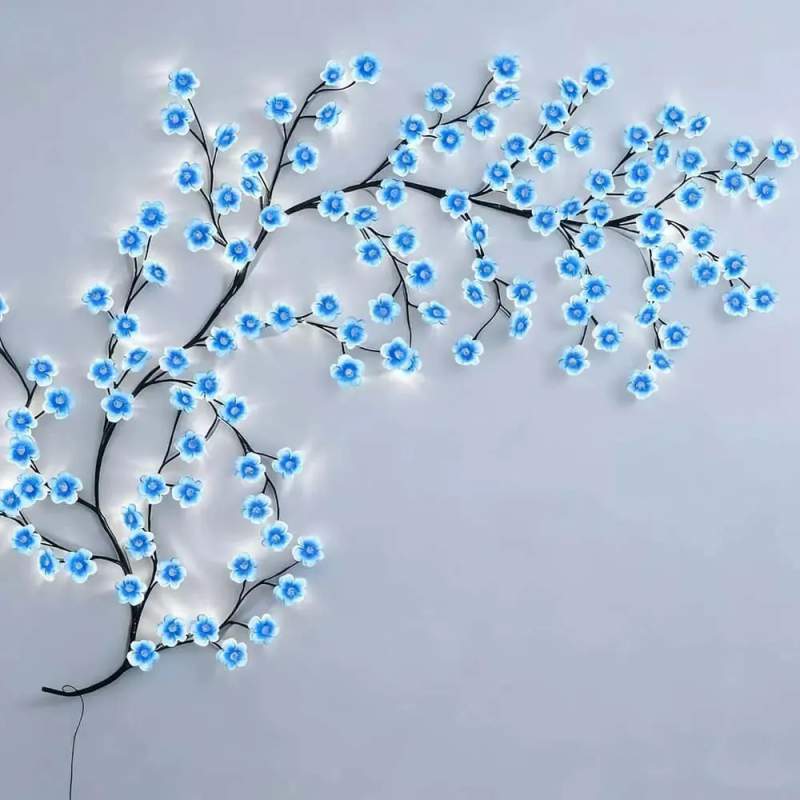 Picture of Blue Cherry Blossom LED Tree Branch Lights for Wall,8 Modes Cherry Blossom Lights with 144 LED,Remote,Timer,Cherry Blossom LED Vine Fairy Lights,Decorations for Bedroom,Wall Art,Christmas - Blue