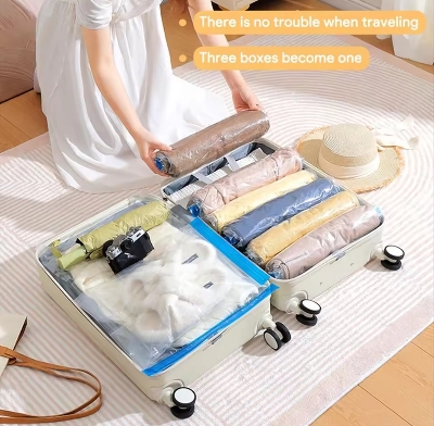 Picture of Hanging Vacuum Compression Storage Bag + Hand Pump for Jacket, Quilt, Coats, Suits, Dresses etc. Travel organizer for luggage, Large Capacity Wardrobe Organizer for Clothes | Space Saver | Reusable Dustproof Wardrobe Bag - hanging bag 100*70CM