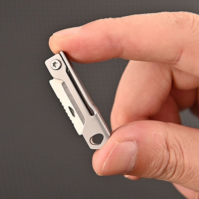 Picture of Outdoor Camping Supplies Stainless Steel Folding Mini Square Head Keychain Pendant Portable Pocket cutter - Grey