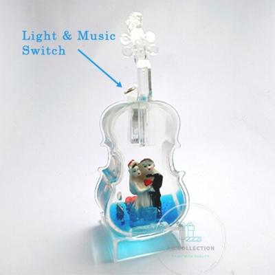 Picture of Getter Shape Couple Showpiece with Music and Lighting (Blue)