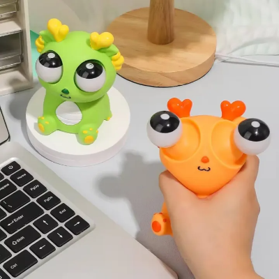 Picture of Eye Popping Dragon Stress Relief Toy | Funny Squeeze Dragon Fidget Toy for Stress Relief & Sensory Play 
