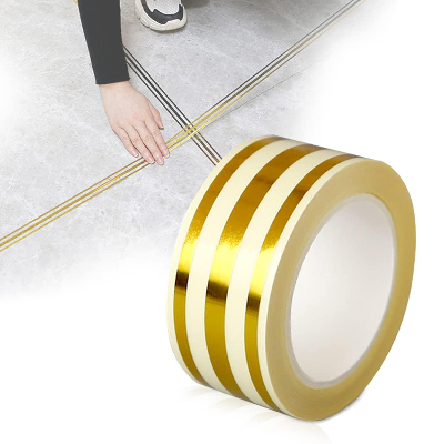 Picture of Interior Design Tape - 5M Golden Tile Gap Tape | Waterproof Self-Adhesive PVC Decorative Strip for Tile, Wall & Cabinet Decoration (2.5CM × 5M) Gold