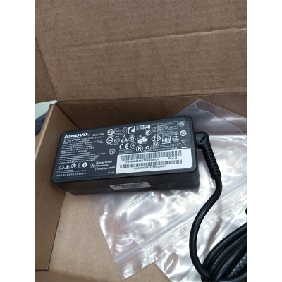 Picture of Lenovo 65W USB Type-C laptop charger. Key details include