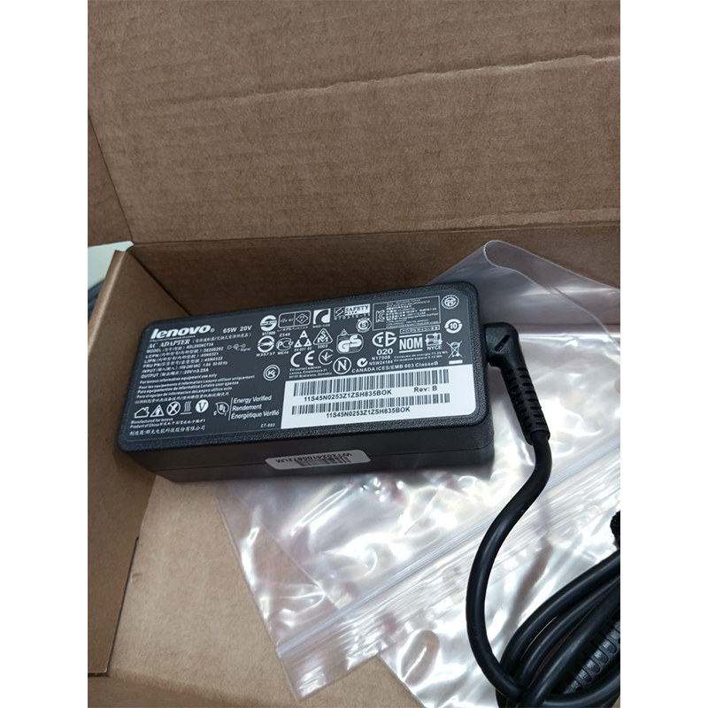 Picture of Lenovo 65W USB Type-C laptop charger. Key details include