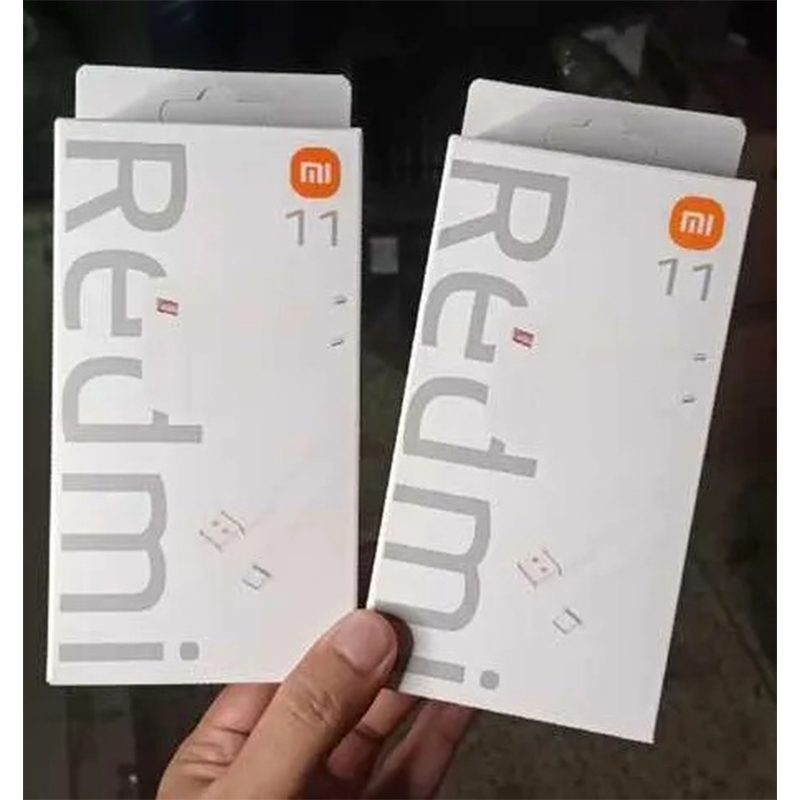 Picture of Xiaomi Redmi 33W Fast Charger, which includes a USB Type-C cable.-White