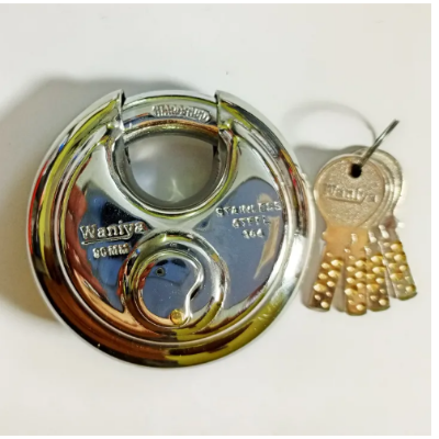 Picture of 90 mm & 100 mm Stainless Steel disc lock with 14 pins, Brass 04 Keys for heavy duty . HI-TEC S S Disc Padlocks Specially made for shutter security. - Silver