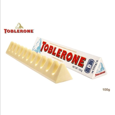 Picture of TOBLERONE WHITE CHOCOLATE WITH HONEY & ALMOND NOUGAT 100GM
