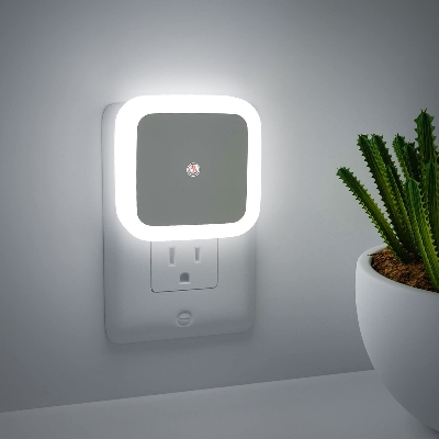 Picture of Mini Wall LED Night Light Auto On/Off Illuminate Your Bedroom with Convenient Nightlight - White