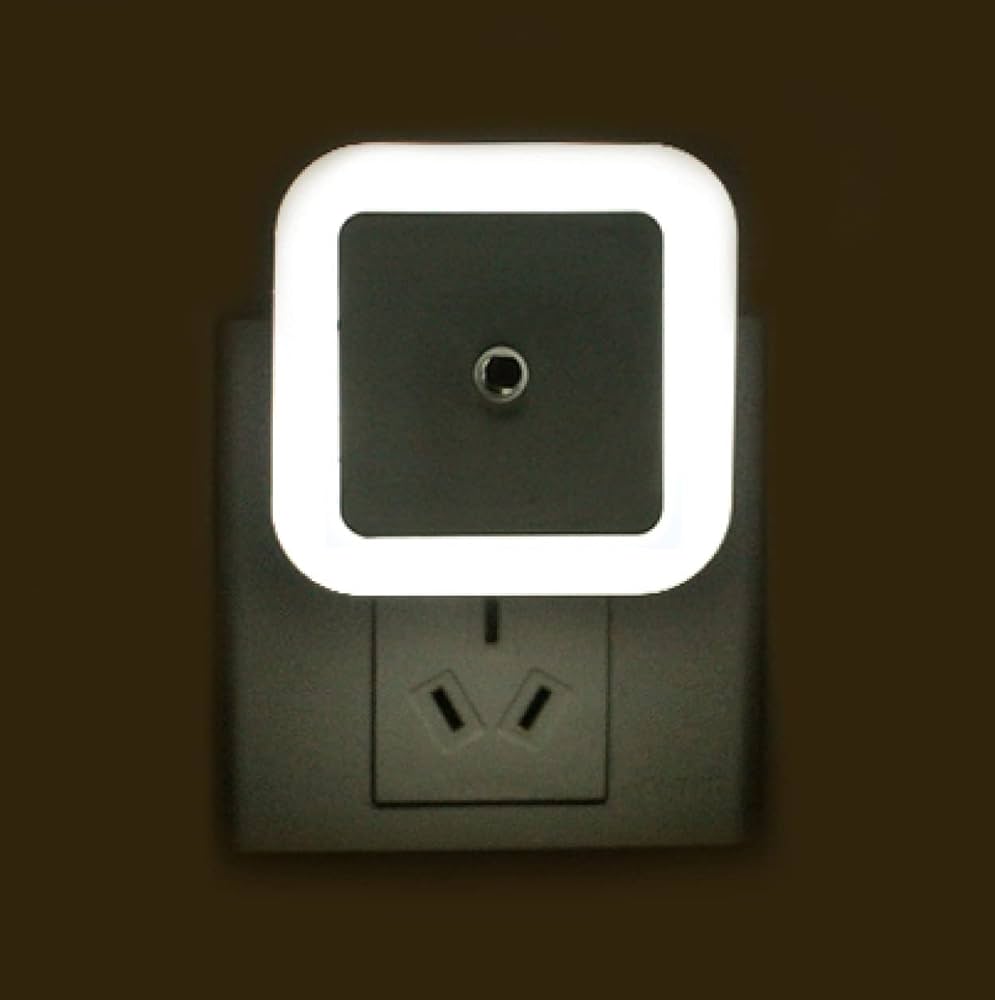 Picture of Mini Wall LED Night Light Auto On/Off Illuminate Your Bedroom with Convenient Nightlight - White