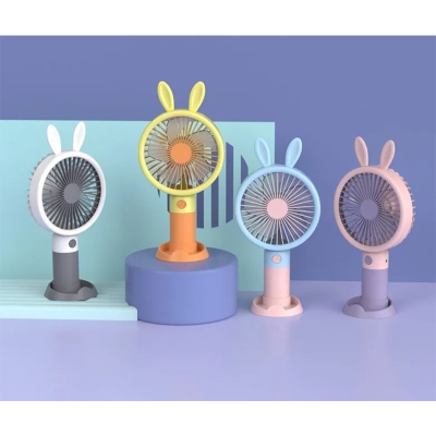 Picture of Cute Cartoon Mini Handheld Fan – USB Rechargeable Portable Fan with Bunny Ears – Silent & Powerful Cooling – Ideal for Home, Office & Travel - Multicolor