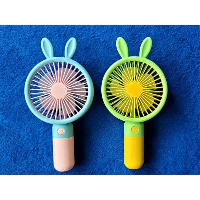 Picture of Cute Cartoon Mini Handheld Fan – USB Rechargeable Portable Fan with Bunny Ears – Silent & Powerful Cooling – Ideal for Home, Office & Travel - Multicolor