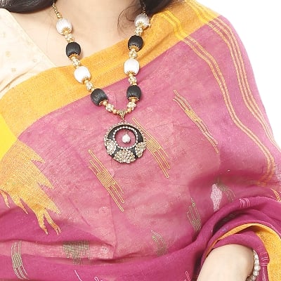 Picture of Tassel Setting Fresh Eggplant Color Monipuri  Saree