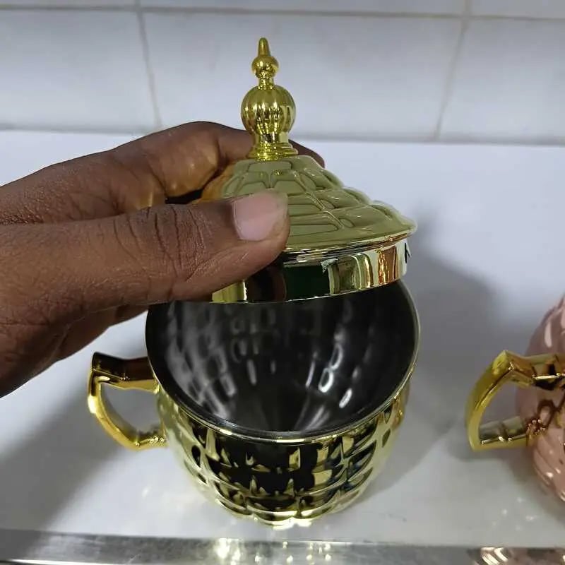 Picture of Luxury Diamond Cut Metallic Mug with Crown Lid (Golden & Rose Gold)