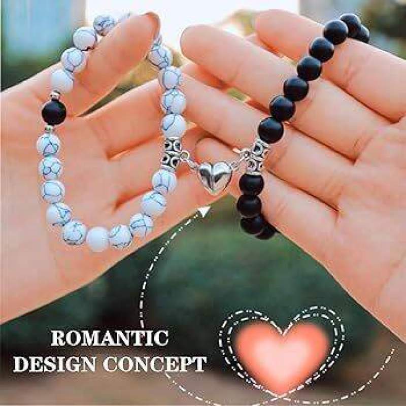 Picture of Magnetic Heart Bracelets for Couples (2 Piece) | Small Rubber Band Magnet Stone Bell Bracelet with Knotted Head Rope (GAME SKU)-L
