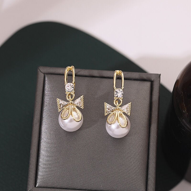 Picture of Delicate Bow Tie Earrings Pearl Metal Girl Earings Jewelry Female Delicate Bow Tie Earrings FOR GIRLS AND WOMEN
