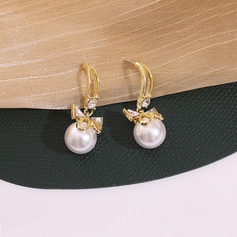 Picture of Delicate Bow Tie Earrings Pearl Metal Girl Earings Jewelry Female Delicate Bow Tie Earrings FOR GIRLS AND WOMEN