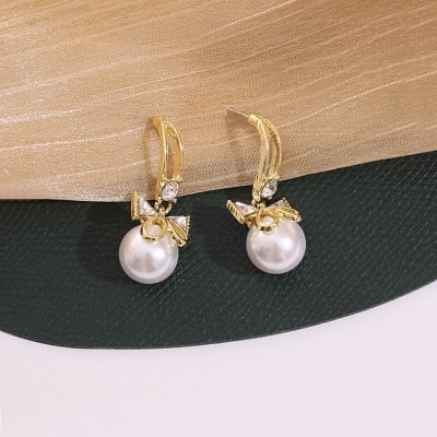 Picture of Delicate Bow Tie Earrings Pearl Metal Girl Earings Jewelry Female Delicate Bow Tie Earrings FOR GIRLS AND WOMEN