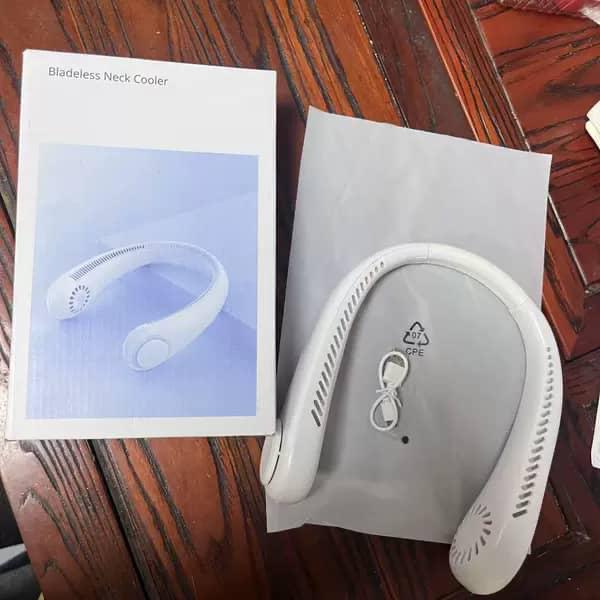 Picture of New Portable Hanging Neck Fan Mini Rechargeable USB 4th Generation 2600 Mah LED Digital Display Cooler 3 Speeds Adjustable Twin Turbo Leafless 360° Bladeless Personal Neckband - Multicolor