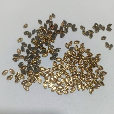Picture of Leaf Shape Golden Kundan Stones – 100 pcs-White