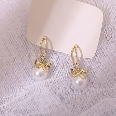 Picture of Delicate Bow Tie Earrings Pearl Metal Girl Earings Jewelry Female Delicate Bow Tie Earrings FOR GIRLS AND WOMEN