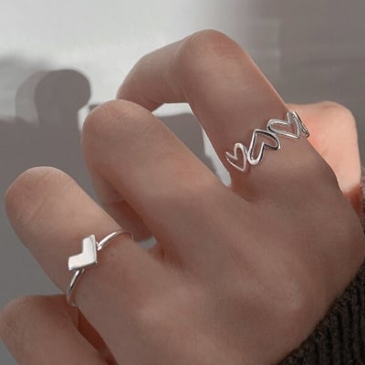 Picture of 2 PCS Adjustable Creative Hollow Heart Finger Rings Set E1 Versatile Personality Autumn Retro Angti Daily Life Jewelry Accessories Birthday Wedding Engagement Bridal Party Fair Festival Gift Item for Female Silver Color