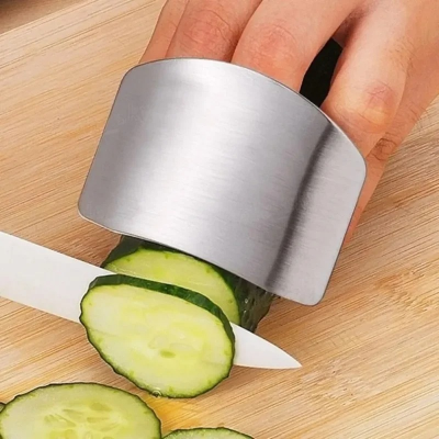 Picture of Stainless Steel vegetable cutter hand guard household finger Guard -kitchen finger Guard tool-The Asia Express-Silver