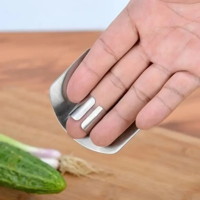 Picture of Stainless Steel vegetable cutter hand guard household finger Guard -kitchen finger Guard tool-The Asia Express-Silver