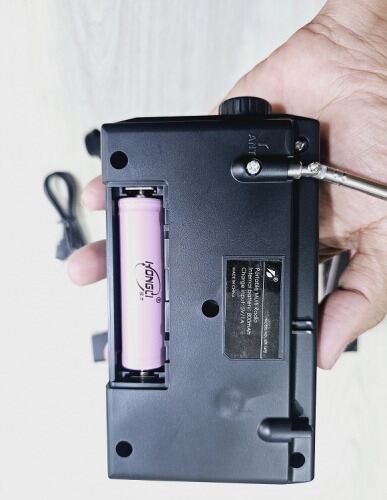 Picture of Kboard KTF-1472 FM Radio & MP3 Player BT Speaker MP3 Player TF USB Flashlight, built-in speaker, and SD card slot. (Multicolor)