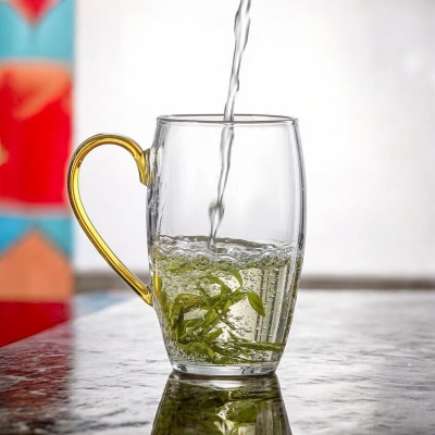 Picture of Clear Borosilicate Glass Tea Cup - 330ml, Heat Resistant, Fireproof, Lightweight, Golden Handle (1pc)
