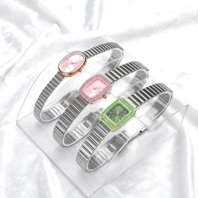 Picture of Luxury Women's Quartz Watch Featuring Elegant Oval and Square Dials with Shimmering Rhinestone Accents and Stylish Stainless Steel Metal Link Straps Perfect for Fashionable Daily Wear and Special Occasions for All.