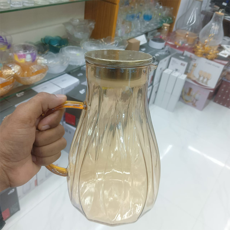 Picture of Glass Water Pitcher with Stainless Steel Lid and Handle, 2-Litre Heat-Resistant Carafe for Hot and Cold Beverages, Modern Multicolor Kettle with BPA-Free Anti-Corrosion Glass Body and Dishwasher-Safe Design
