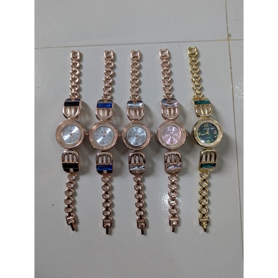 Picture of Elegant Rose Gold and Gold Bracelet Watches for Women with Vibrant Gemstone Accents Including Emerald Green, Royal Blue, and Crystal White Dials Perfect for Party Wear and Special Occasion Gifting.