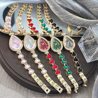 Picture of Elegant freestyle quartz watch for women with embedded diamonds, water drop shaped water box, colorful heart braceletBlue, Pink, Black, Red, Off White