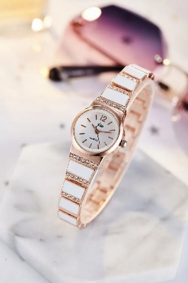 Picture of inspried by The new model is the brand Korean fashion ladies watch women's steel belt bracelet student luxury rhinestone foreign trade watchWhite, Black, Red