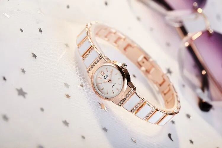 Picture of inspried by The new model is the brand Korean fashion ladies watch women's steel belt bracelet student luxury rhinestone foreign trade watchWhite, Black, Red