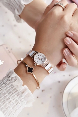 Picture of inspried by The new model is the brand Korean fashion ladies watch women's steel belt bracelet student luxury rhinestone foreign trade watchWhite, Black, Red
