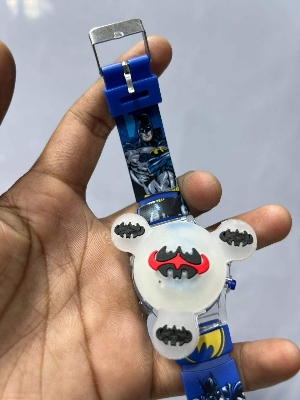 Picture of Time Up Digital Dial Cartoon Revolving Cap Glowing Light Cartoon Printed Strap Colorful Kids Watch for Boys & Girls (Age:4-12 Years) -RC56-YPurple, Royal Blue, Red, Black, Blue