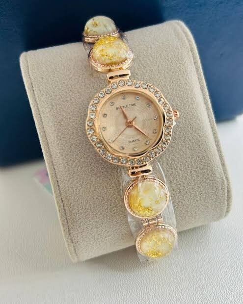Picture of Titan Raga Power Pearls Quartz Analog Mother Of Pearl Dial faceted MOP Strap Watch for Women 95250WM01F-Brown
