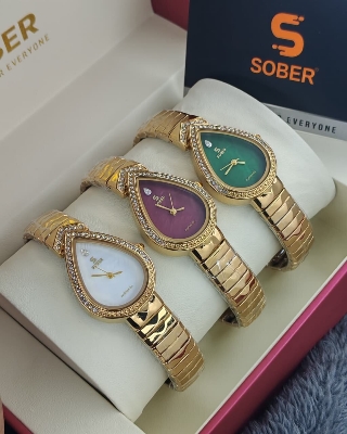 Picture of Women's Wristwatch Fashion Golden Silver Casual Quartz Bracelet Watch Niche Elegant Waterproof Hand Clock for WomenGold, Purple, Two Tone