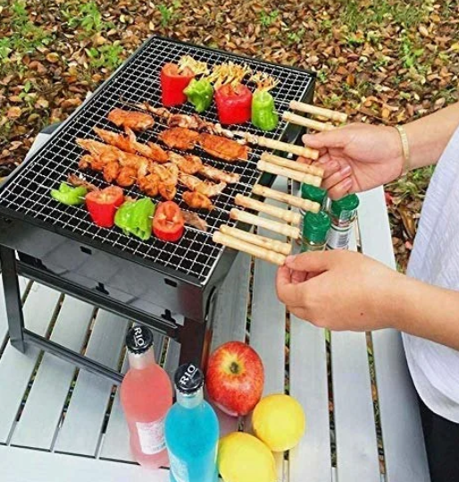 Picture of Portable BBQ Grill with Foldable Stand, Heavy-Duty Stainless Steel Construction - Multicolor