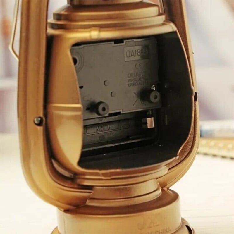 Picture of Antique Style Hurricane Lantern Table Clock | Decorative Metal Lantern Clock for Mantel & Office | Retro Kerosene Lamp Aesthetic | Farmhouse Shelf Decor | Unique Housewarming Gift | Bronze Finish Desktop Timepiece | Nostalgic Interior Accent-Multicolor