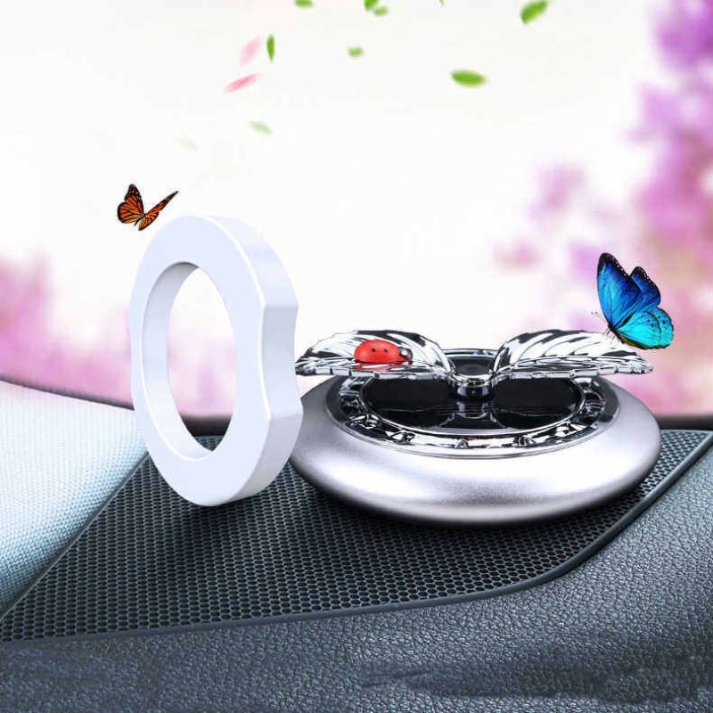 Picture of Hot Car Perfume Ornaments Creative Solar Rotation Leaf Car Aromatherapy Air Fresher Alloy Fragance Diffuser Car Decoration
