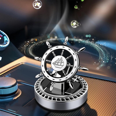 Picture of Solar Rotating Ship Wheel Car Air Freshener – Luxury Dashboard Perfume with Compass Design