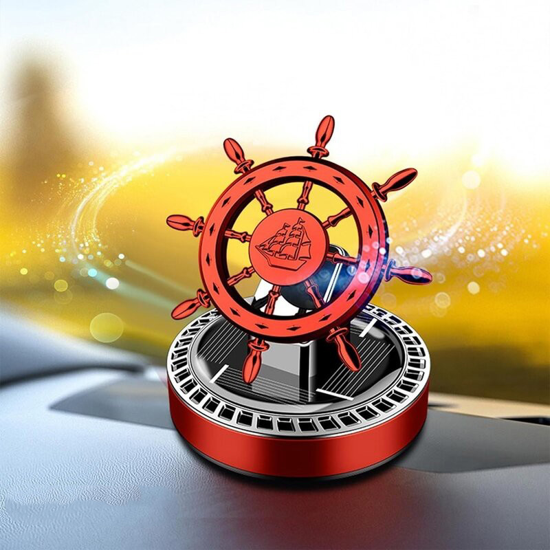 Picture of Solar Rotating Ship Wheel Car Air Freshener – Luxury Dashboard Perfume with Compass Design