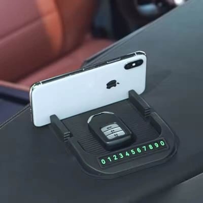 Picture of 4-in-1 car anti-slip silicone dashboard pad and mobile phone holder.