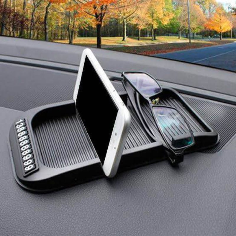 Picture of 4-in-1 car anti-slip silicone dashboard pad and mobile phone holder.