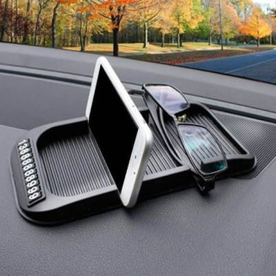 Picture of 4-in-1 car anti-slip silicone dashboard pad and mobile phone holder.