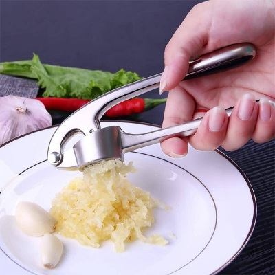 Picture of Professional Garlic Press  Garlic Mincer with Soft Easy Ergonomic Handle, Easy Clean and Rust Free Garlic Presser, Sturdy Garlic Crusher for Garlic & Nuts Stainless Steel Color-Silver