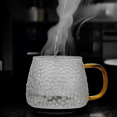 Picture of High Borosilicate Glass Cup with Golden Handle - Eco-Friendly and Stocked, 420ml Capacity for Tea, Coffee, and Water