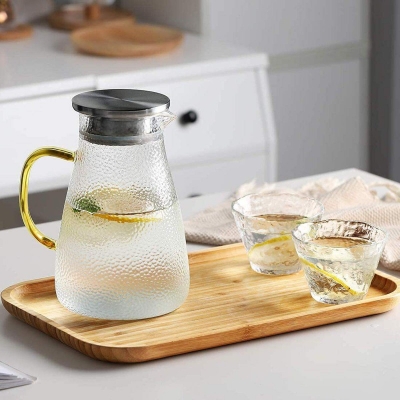 Picture of Glass Pitcher with Lid and Golden Handle- 1.5 Litre - Borosilicate Glass Water Sun Tea Jar for - Iced Tea, Juice, Milk, Coffee, Fruit Hot & Cold Beverages Carafe-transprent